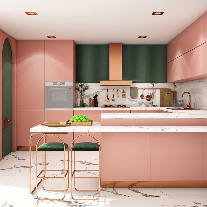 Một tông màu hồng khác được sử dụng trong không gian bếp - kết hợp với chất liệu đá cẩm thạch của sàn và mặt bàn mang đến sự sang trọng