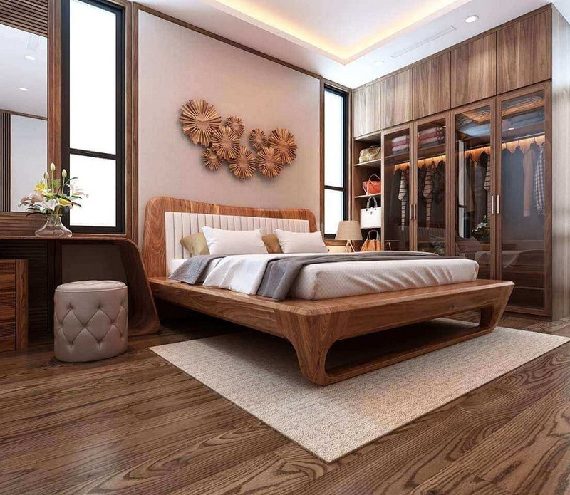 Nội thất phòng ngủ sử dụng chất liệu gỗ ấm áp, được sắp xếp ngăn nắp tạo cảm giác sạch sẽ, gọn gàng
