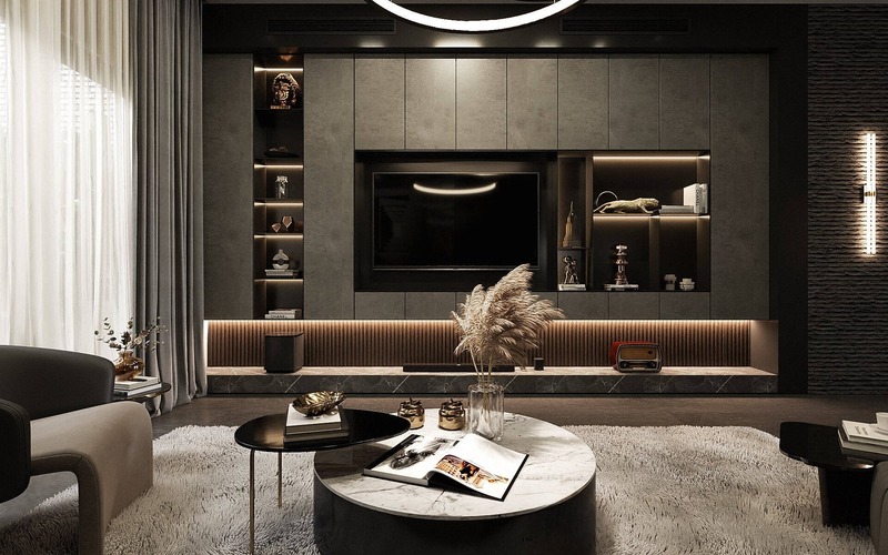 Không gian nội thất tông màu đen hiện đại với điểm nhấn là bàn trà hình tròn mặt đá sang trọng của chủ nhà mệnh Thủy