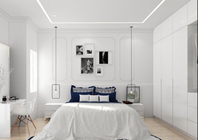 Nội thất phòng ngủ màu trắng thanh lịch kết hợp với vỏ gối màu xanh lam và hệ đèn ngủ bằng kim loại bắt mắt, rất phù hợp với chủ nhà mệnh Thủy