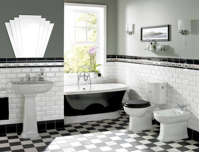 Gạch đen trắng cổ điển được sử dụng trên sàn nhà tắm kết hợp với gạch chữ nhật ốp trên tường tạo nên không gian hình học của phong cách Art Deco