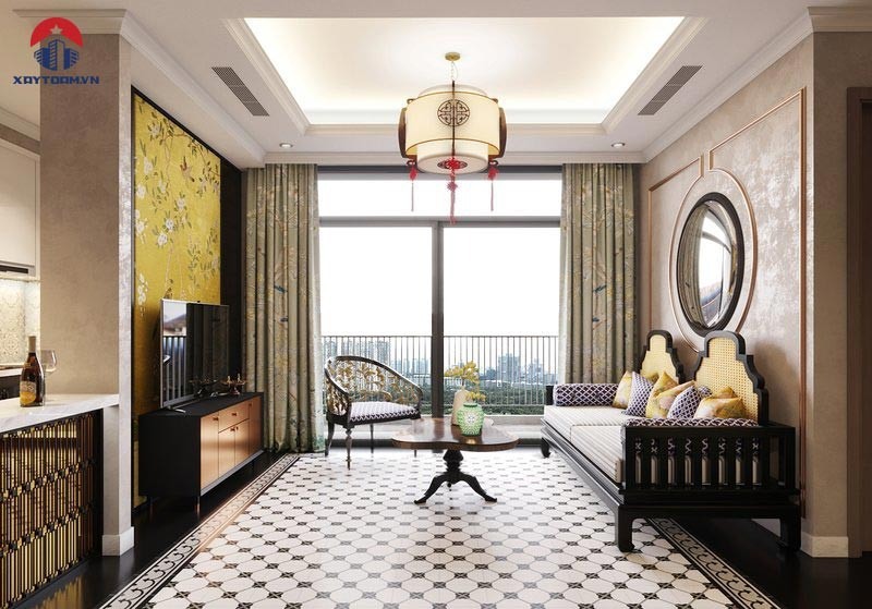 Không gian nội thất phòng khách theo thiết kế Indochine có điểm nhấn là hệ sàn gạch bông với họa tiết kỷ hà