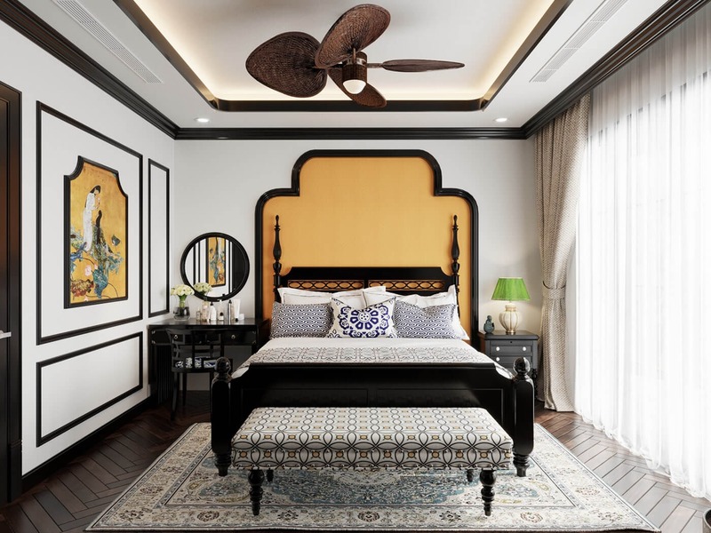 Không gian phòng ngủ phong cách Indochine có điểm nhấn là hệ đèn hoa cùng các họa tiết đồng tiền đặc trưng