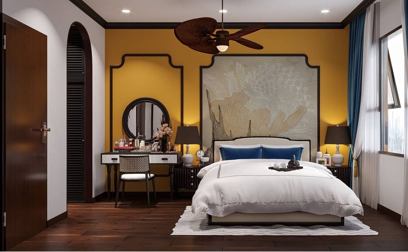 Không gian phòng ngủ phong cách Indochine mang màu sắc vàng - trắng đặc trưng và được điểm xuyết một chút sắc xanh, giúp không gian nội thất trở nên ấn tượng