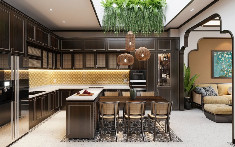 Căn bếp phong cách Indochine mang tông màu nâu - vàng đặc trưng và có điểm nhấn ở tiểu cảnh cây xanh ấn tượng
