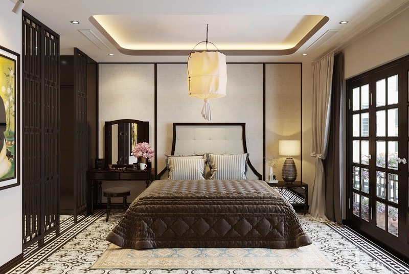 Phòng ngủ Indochine sử dụng nội thất gỗ làm chủ đạo, kết hợp với hệ thống ánh sáng vàng tạo nên không gian ấm áp